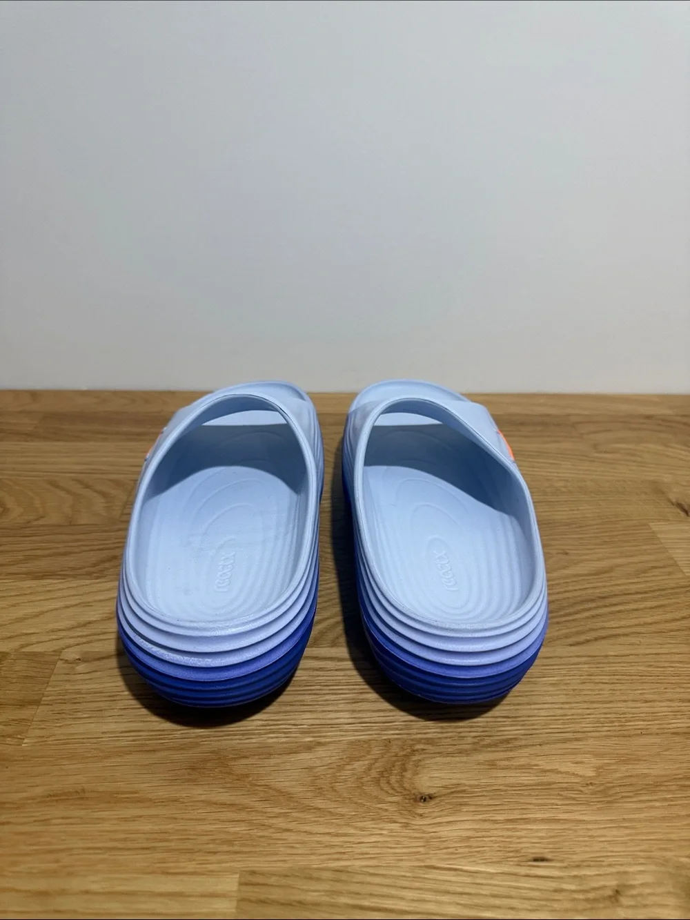 Brand new men’s size 9 Nike Rejuven8 Light Blue Slide Sandals with Orange Swoosh